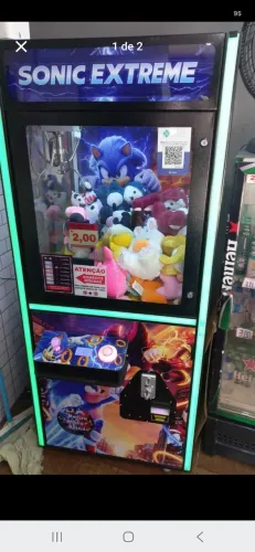Maquina grua de pelúcias levando as 2 faço 5.500 cada