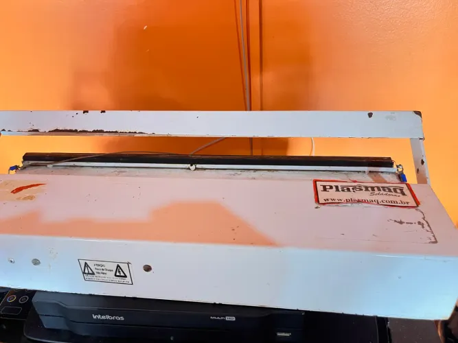 Embaladora com defeito para troca de fio de aquecimento 