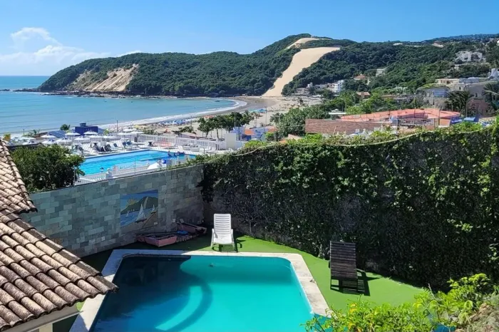 Dúplex com vista para o mar e Morrão 2 quartos 2 banheiros 57m² piscina e portaria 24h