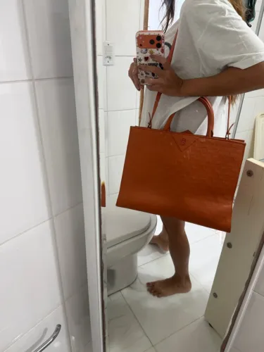 Bolsa laranja Schutz