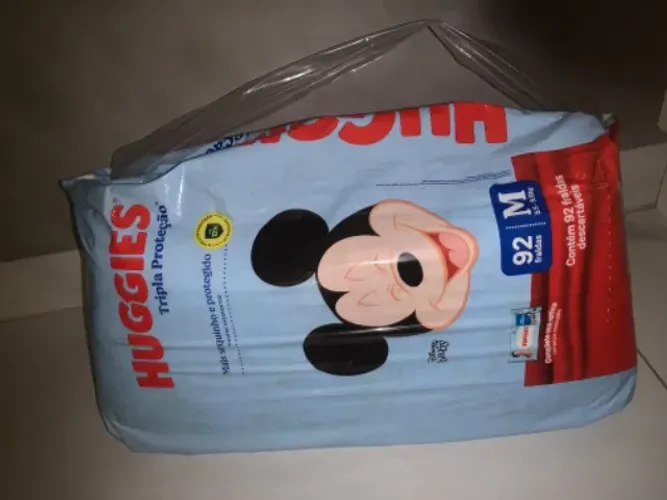 Fralda huggies tripla proteção tamanho M 92 unidades