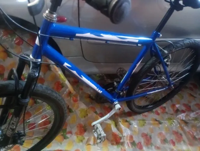 Bicicleta adulto c freio á disco, e amortecedor MODE aro 26 21V (ENTREGO Á DOMICÍLIO )