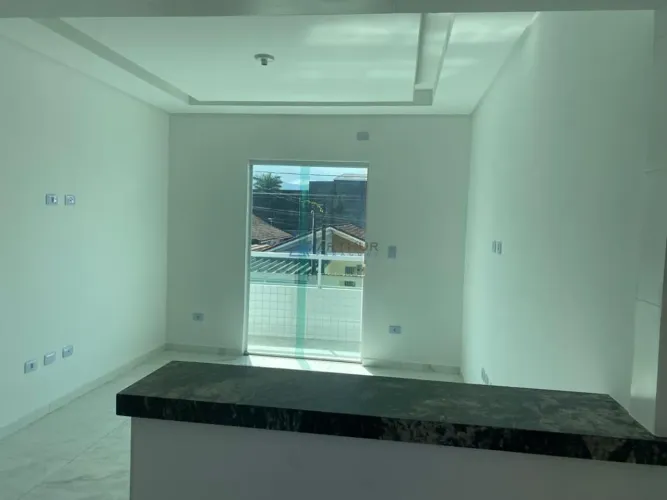 Casa de Condomínio Sobreposta Alta com sacada à venda em Praia Grande