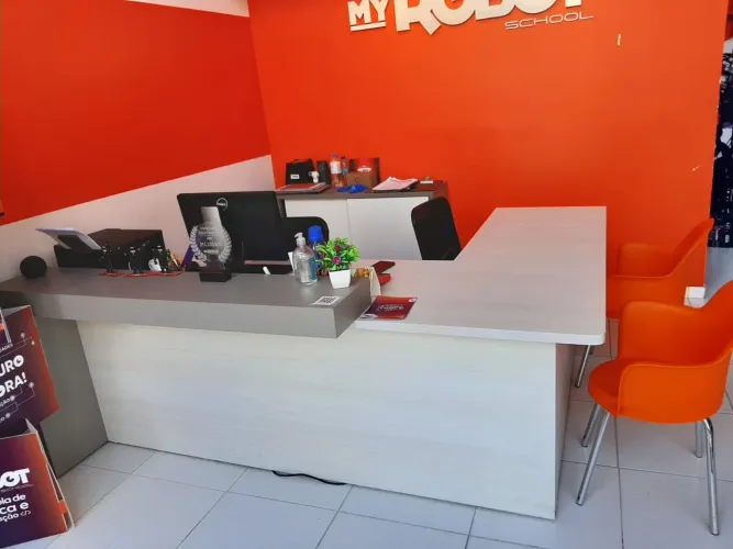 Mesa em L / Recepção
