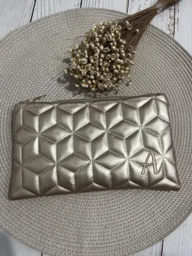 necessaire slim dourada