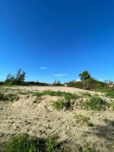 250m do mar. Terreno de 1560m² aterrado escriturado e documentado 30X52 Praia do Sol