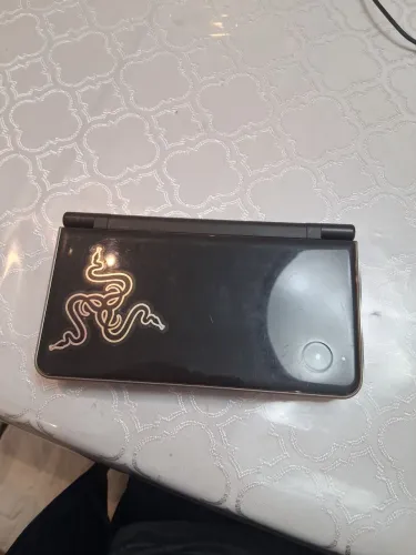 Nintendo ds i Xl a tela de baixo tem um problema