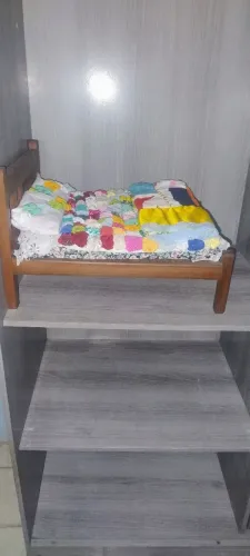 Cama de boneca 