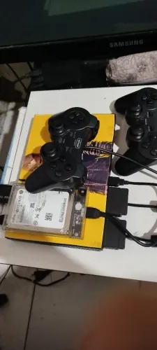 PS2 com 2 controles 1 HD com vários jogos