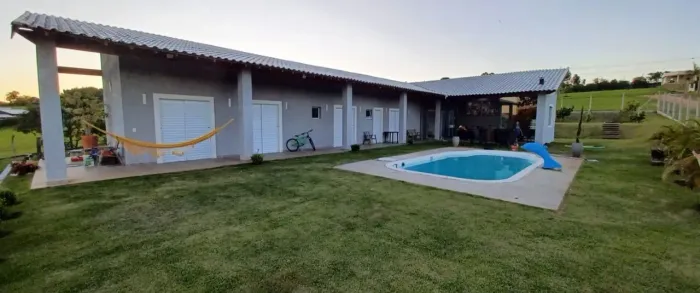 Chacara em condomínio fechado- Pinheiros do Lago com 1032m2 de terreno.