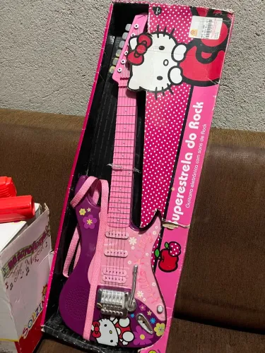 Brinquedo guitarra eletrônica hélio kitty