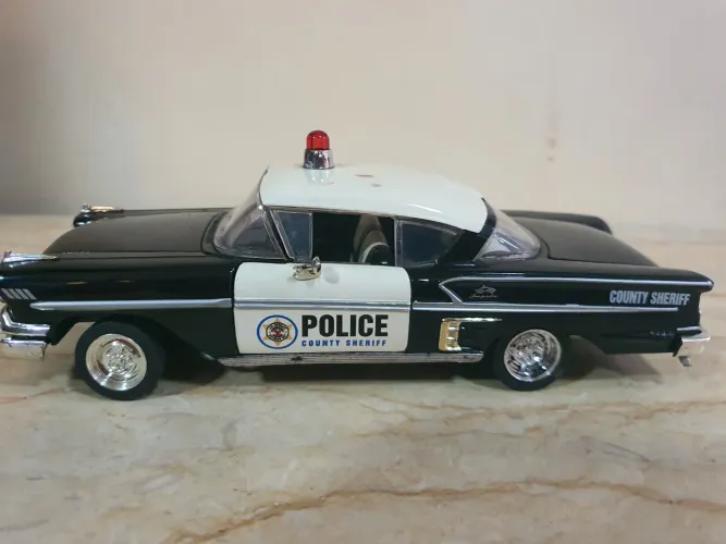 VEÍCULO POLICIAL IMPALA CHEVY 1958