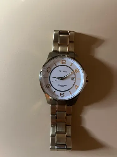 Relógio Orient masculino dourado