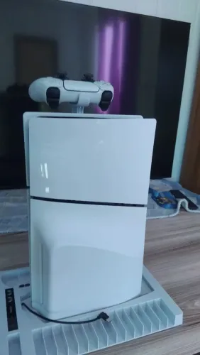 vendo um PS5 semi-novo. 4 meses de uso, acompanhado da nota fiscal e um suporte. 