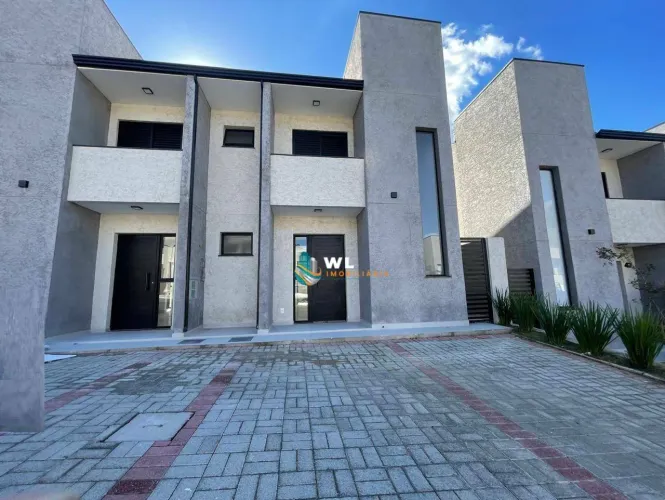 Casa com 2 dormitórios para alugar, 120 m² por R$ 5.000,00/mês - Bairro Vila Omizollo - Lo