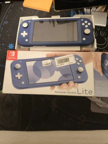 Nintendo switch lite na caixa