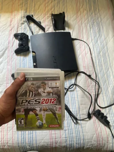 Vendo ps3 slim desbloqueado completo por 850 reais