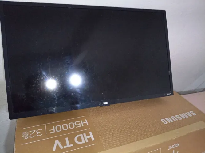 Tv AOC 32 polegadas Smartv, com Roku Tv 