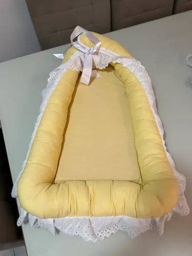 Ninho redutor de berço