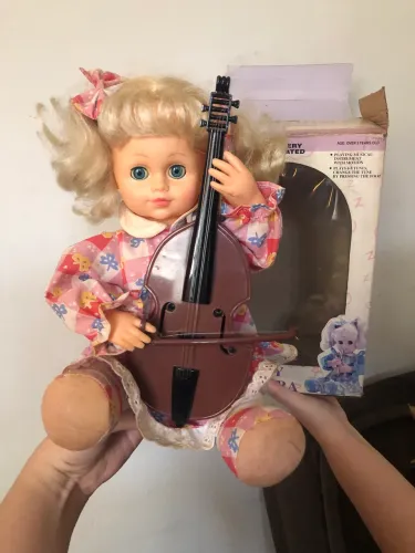 Boneca Melody Orchestra