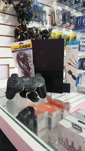 Playstation 2 com controle, cabos, jogos e acessórios