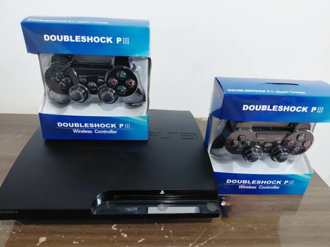PS3 SLIM C/5 MIL JOGOS + 2 CONTROLES COM GARANTIA