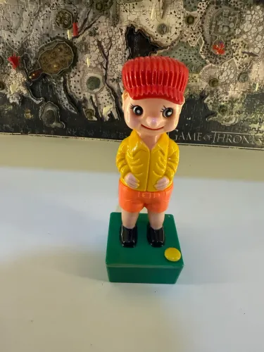 Boneco Antigo que faz Xixi