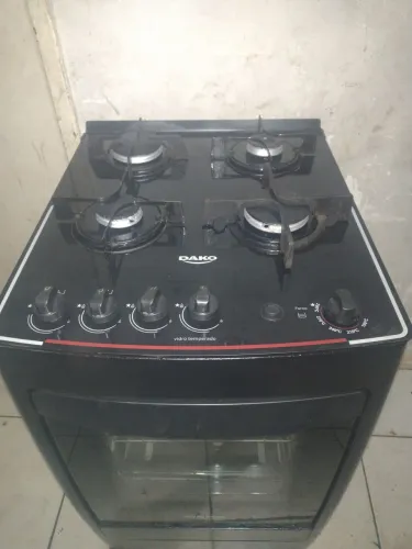 Fogão Dako 4 bocas todo de vidro praticamente novo pra hj temos entrega não e elétrico