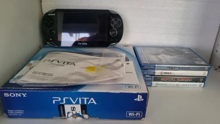 Ps Vita + jogos + acessórios