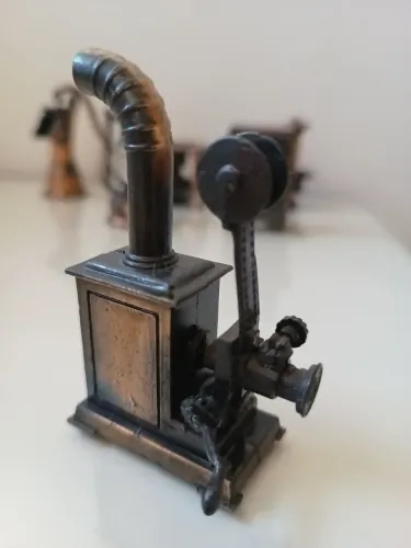 Miniatura de ferro apontador projetor de cinema antigo
