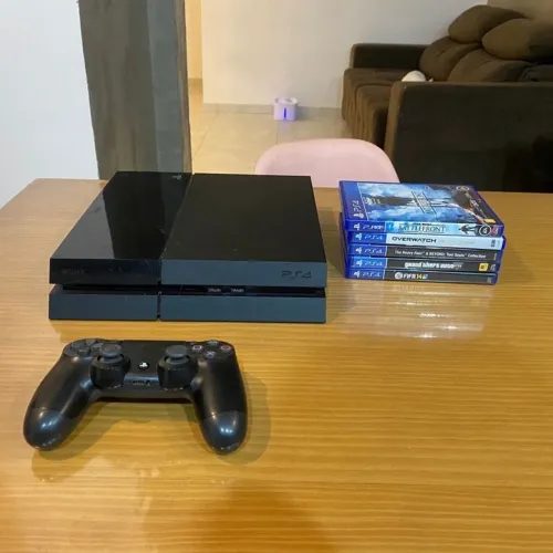 PlayStation 4 + 2 controles + 10 jogos de mídia física funcionando 100%