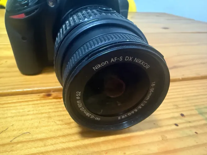 Máquina fotográfica lei a descrição