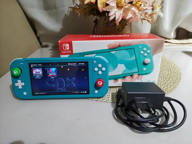 Nintendo switch lite d.e.s.b.l.o.q.u.e.a.d.o aceito cartão e trocas
