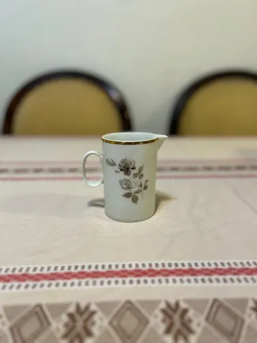 Leiteira em porcelana Renner Porto Alegre