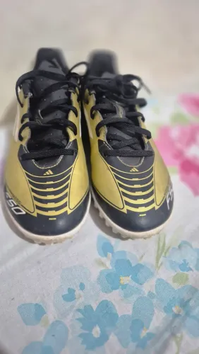 Chuteira f50 do Messi Society