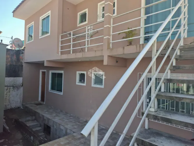 Casa e apartamentos no bairro Forquilhas, em São José - SC