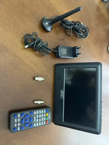 Mini Tv portátil mais antena 36 canais.