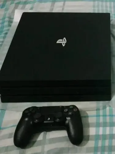Vendo ps4 pro com 8 jogos modelo CUH-7216B a melhor versão