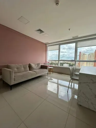 Sala mobiliada para locação no Navarro Building, com uma vaga de garagem.
