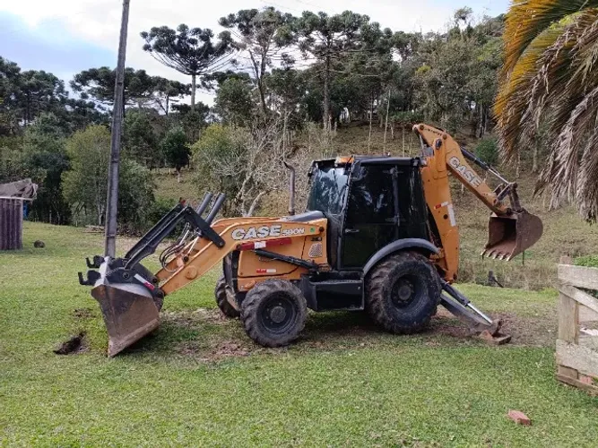 Retroescavadeira Case 580
