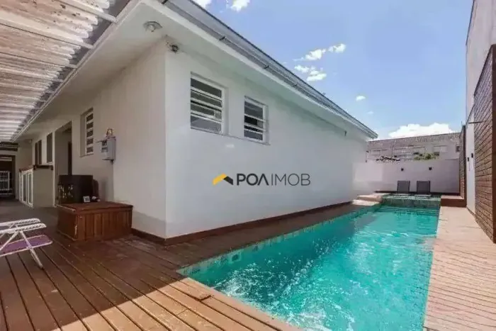 Casa com 3 dormitórios para alugar, 280 m² por R$ 10.510,00/mês - Jardim Lindóia - Porto A