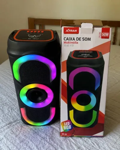 Caixa de som bluetooth com RBG nova na caixa