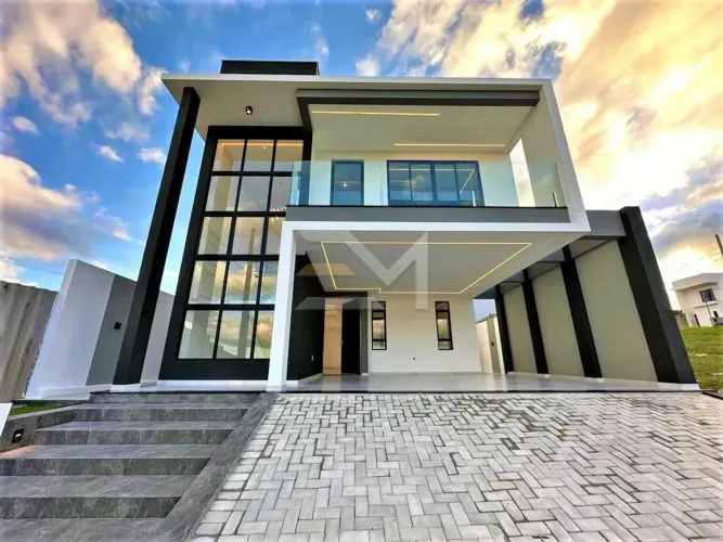 Casa espetacular em condomínio com 4 suítes, espaço gourmet e uma bela vista definitiva!