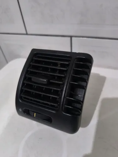 Difusor de ar Vectra lado carona