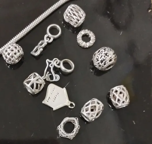 Separador pulseira e berloque de prata