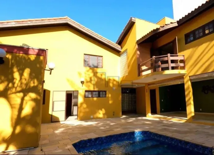 Casa com 5 suítes para alugar, 540 m² por R$ 9.500/mês - Condomínio Residencial Isaura - S