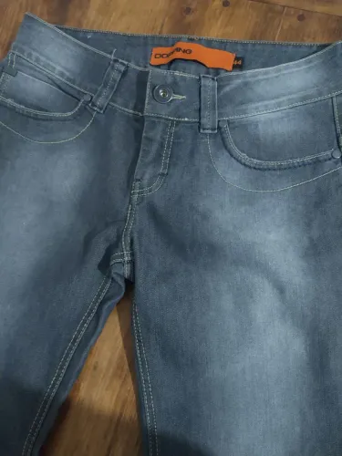 Calça jeans, Dopping
