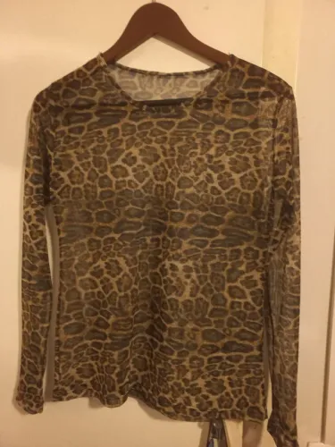 Blusa de onça transparente 