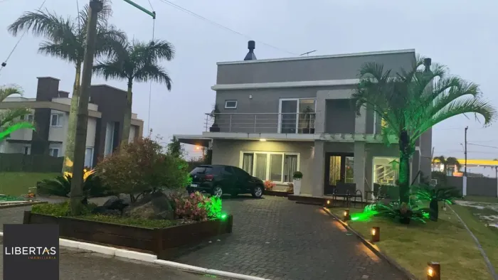 Casa sobrado no Condomínio Golden River em Imbé com 4 dormitórios