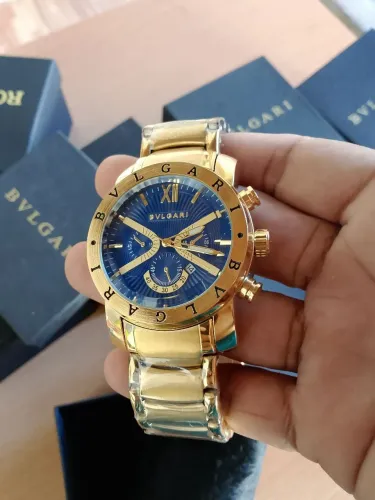 Relógio bulgari dourado masculino fundo transparente pra vender logo